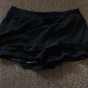 Black lululemon running skirt size 4